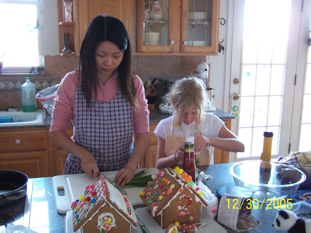 100_2917 Jennifer and Kayla cooking Christmas International House